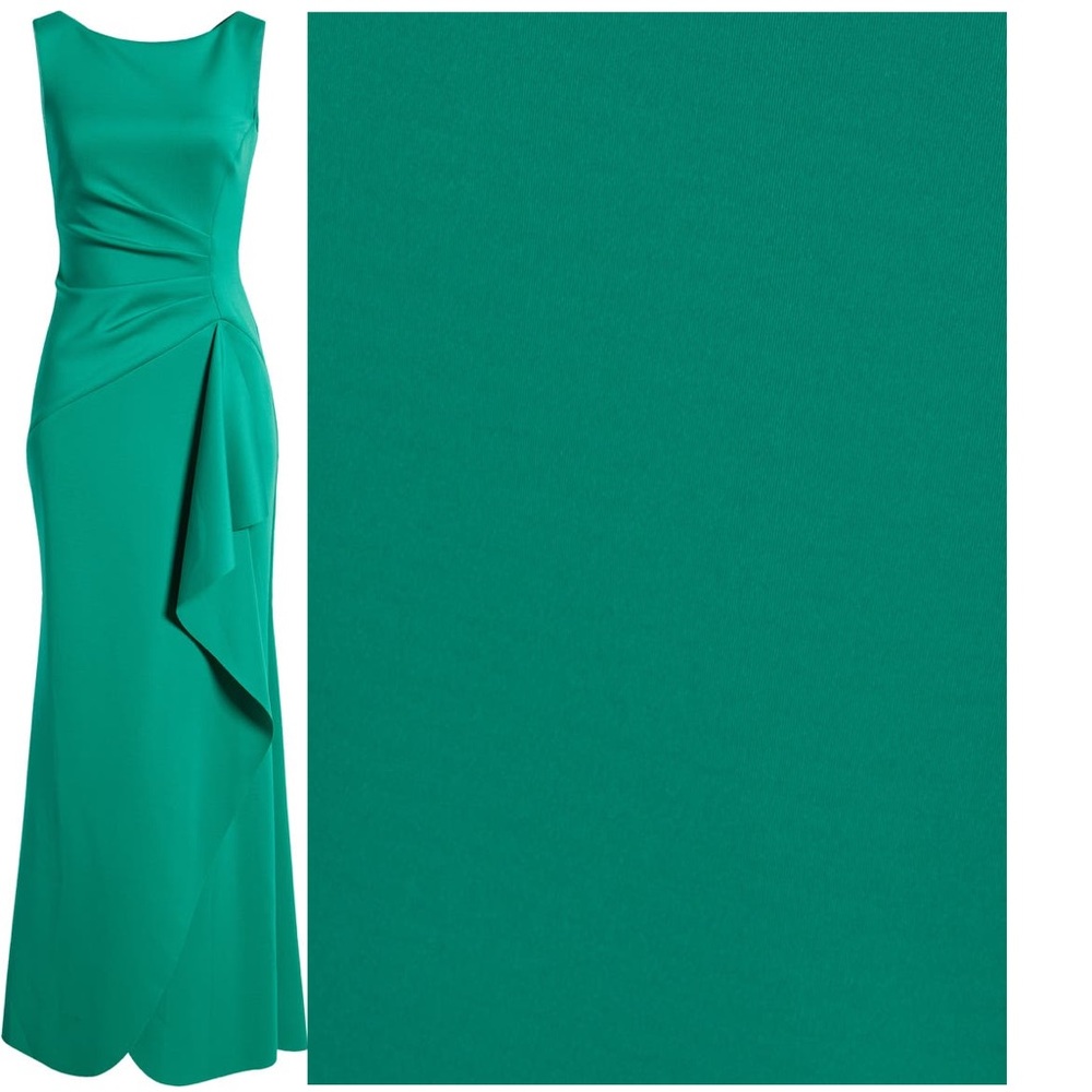 gorgeous evening gown with an elegant bateau neck and a floor-pooling skirt.